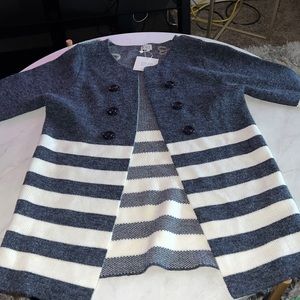 This is a large cardigan by Keren Hart. Color is Navy